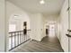 Open entryway with wood-look floors and views to kitchen and living room at 1688 Crest Ave, Las Vegas, NV 89119