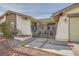 Front entry with decorative gate and walkway to the house at 1688 Crest Ave, Las Vegas, NV 89119