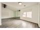 Sunlit living room, vaulted ceiling and wood floors at 1688 Crest Ave, Las Vegas, NV 89119