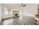 Living room featuring a fireplace and ceiling fan at 1688 Crest Ave, Las Vegas, NV 89119