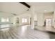 Spacious living room with vaulted ceiling and wood-look floors at 1688 Crest Ave, Las Vegas, NV 89119