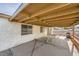 Covered patio with seating area, grill, and pool view at 1688 Crest Ave, Las Vegas, NV 89119