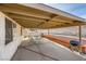 Covered patio with seating area, grill, and pool view at 1688 Crest Ave, Las Vegas, NV 89119