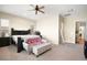 Bright bedroom with a king-size bed and ample space at 2 Lago Turchino Ct, Henderson, NV 89011