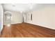 Living room with hardwood floors and a view to another room at 2 Lago Turchino Ct, Henderson, NV 89011