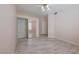 Well-lit bedroom featuring a mirrored closet and tile floors at 2050 W Warm Springs Rd # 712, Henderson, NV 89014