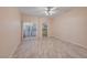 Bright bedroom with tile floors, walk-in closet, and sliding door to patio at 2050 W Warm Springs Rd # 712, Henderson, NV 89014