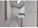 Laundry room with washer, dryer, and white cabinets at 2050 W Warm Springs Rd # 712, Henderson, NV 89014