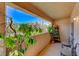 Private patio with seating area and scenic views at 2050 W Warm Springs Rd # 712, Henderson, NV 89014