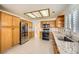 Spacious kitchen featuring stainless steel appliances and granite countertops at 2520 Palmridge Dr, Las Vegas, NV 89134