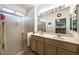 Bathroom boasts dual sinks, a shower, and plenty of storage at 2612 Harrisburg Ave, Henderson, NV 89052