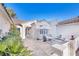 Charming courtyard with brick pavers and seating area at 2612 Harrisburg Ave, Henderson, NV 89052