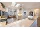 Well-lit kitchen with an island and stainless steel appliances at 2612 Harrisburg Ave, Henderson, NV 89052