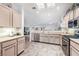 Kitchen with stainless steel appliances and ample counter space at 2612 Harrisburg Ave, Henderson, NV 89052