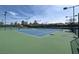 Well-maintained tennis courts with green surface at 2612 Harrisburg Ave, Henderson, NV 89052