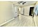 Bright bedroom with wood-look floors and ceiling fan at 2631 Aracatuba Ave, Las Vegas, NV 89121