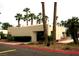 Community building with palm trees and landscaping at 2631 Aracatuba Ave, Las Vegas, NV 89121