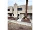 Updated condo exterior with walkway and desert landscaping at 2631 Aracatuba Ave, Las Vegas, NV 89121