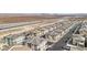 Aerial view of houses and a highway in the background at 2669 Champagne Gold Ave, North Las Vegas, NV 89086