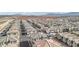 Aerial view of a residential area with houses and a highway at 2669 Champagne Gold Ave, North Las Vegas, NV 89086