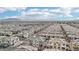 Aerial view of a community featuring numerous houses and roads at 2669 Champagne Gold Ave, North Las Vegas, NV 89086