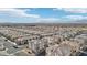 Aerial view of a large community with numerous houses at 2669 Champagne Gold Ave, North Las Vegas, NV 89086