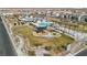 Aerial view of community amenities including pools, playground, and green spaces at 2669 Champagne Gold Ave, North Las Vegas, NV 89086