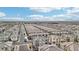 Aerial view of a residential neighborhood with houses and streets at 2669 Champagne Gold Ave, North Las Vegas, NV 89086