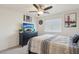 Bedroom with ceiling fan and dresser at 2669 Champagne Gold Ave, North Las Vegas, NV 89086