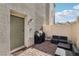 Private patio with seating area and built-in grill at 2669 Champagne Gold Ave, North Las Vegas, NV 89086