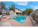 Inviting swimming pool with diving board in the backyard at 2923 Palora Ave, Las Vegas, NV 89121