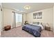 Spacious bedroom with a large bed and neutral decor at 2934 Tremont Ave, Henderson, NV 89052