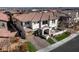 Two-story house with tile roof, driveway, and landscaping; city views at 304 Elder View Dr, Las Vegas, NV 89138