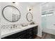 Modern bathroom with double vanity and walk-in shower at 304 Elder View Dr, Las Vegas, NV 89138