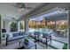 Relaxing covered patio with seating area, adjacent to the pool at 304 Elder View Dr, Las Vegas, NV 89138