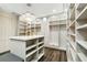 Spacious walk-in closet with custom built-ins and island at 304 Elder View Dr, Las Vegas, NV 89138