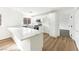 Modern kitchen with stainless steel appliances and white cabinetry at 3327 Erva St # 205, Las Vegas, NV 89117