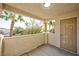 Covered patio with access to a private door and a view of the community at 3327 Erva St # 205, Las Vegas, NV 89117