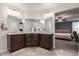 Elegant bathroom with double vanity and granite countertop at 4036 Floating Fern Ave, North Las Vegas, NV 89084