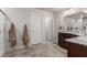 Double vanity bathroom with granite countertops and a walk-in shower at 4036 Floating Fern Ave, North Las Vegas, NV 89084