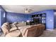 Bright bonus room with handprint wall and comfy seating at 4036 Floating Fern Ave, North Las Vegas, NV 89084