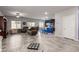 Bright and airy living room with an open floor plan, seamlessly connecting to the kitchen at 4036 Floating Fern Ave, North Las Vegas, NV 89084