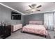 Elegant main bedroom featuring a king-size bed and modern decor at 4036 Floating Fern Ave, North Las Vegas, NV 89084