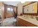 Bathroom with tub, shower, and vanity at 4365 Topaz St, Las Vegas, NV 89121