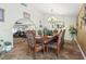 Elegant dining room with ornate furniture and a chandelier at 4365 Topaz St, Las Vegas, NV 89121