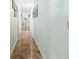 Long hallway with tile flooring at 4365 Topaz St, Las Vegas, NV 89121