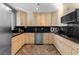 Modern kitchen featuring granite countertops and ample cabinetry at 4365 Topaz St, Las Vegas, NV 89121