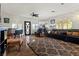 Relaxing living room, featuring a large sectional sofa and circular window at 4365 Topaz St, Las Vegas, NV 89121