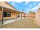 Covered patio and gravel backyard with block wall at 4642 Via San Rafael, Las Vegas, NV 89103