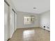 Simple bedroom with tile floors and a large window at 4642 Via San Rafael, Las Vegas, NV 89103